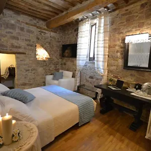 Couette-café Brizi, Assise